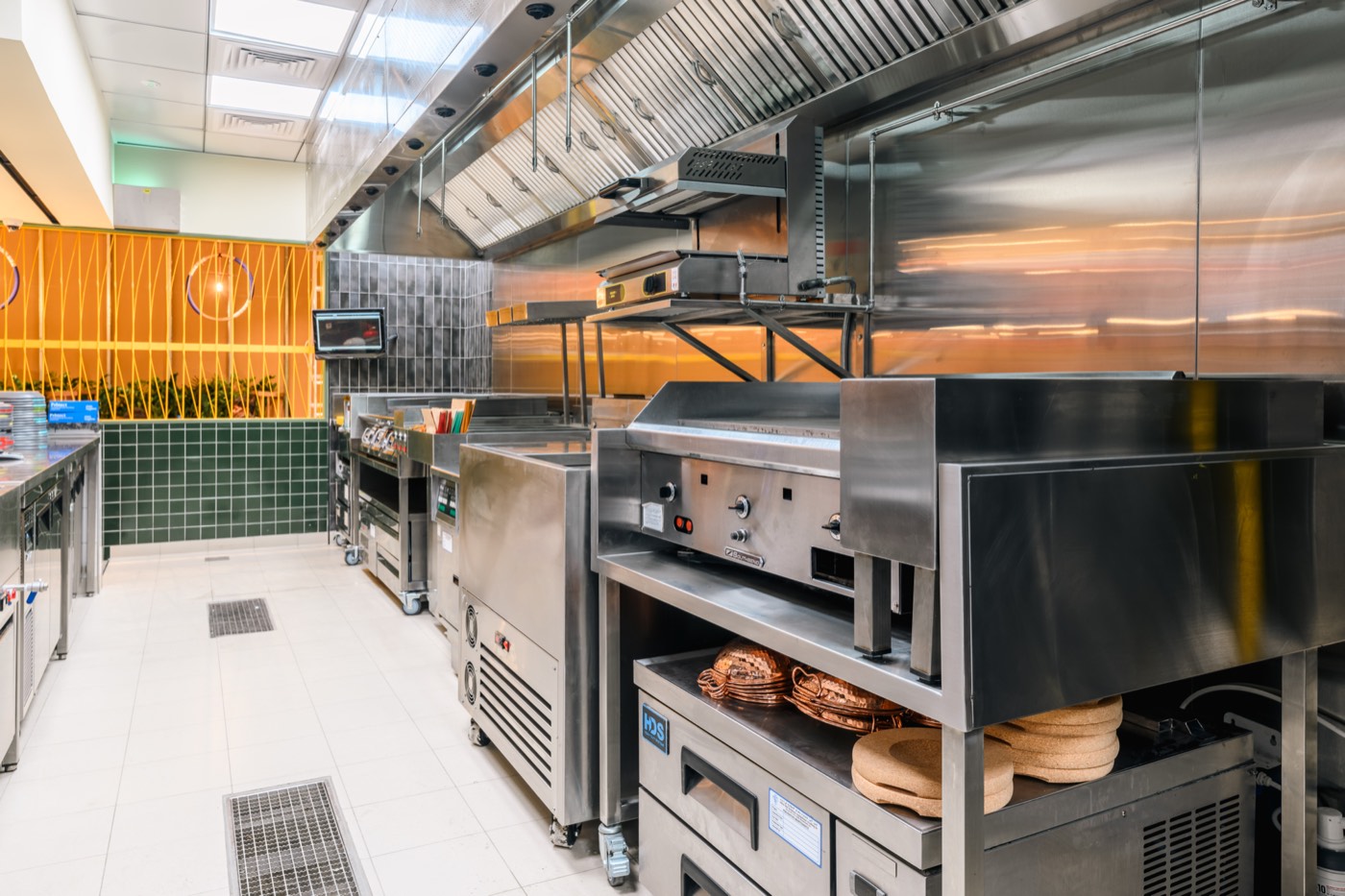 Nando's Damac Hills 2 kitchen cook line, grills and stainless steel passes installed by Cleresdyne